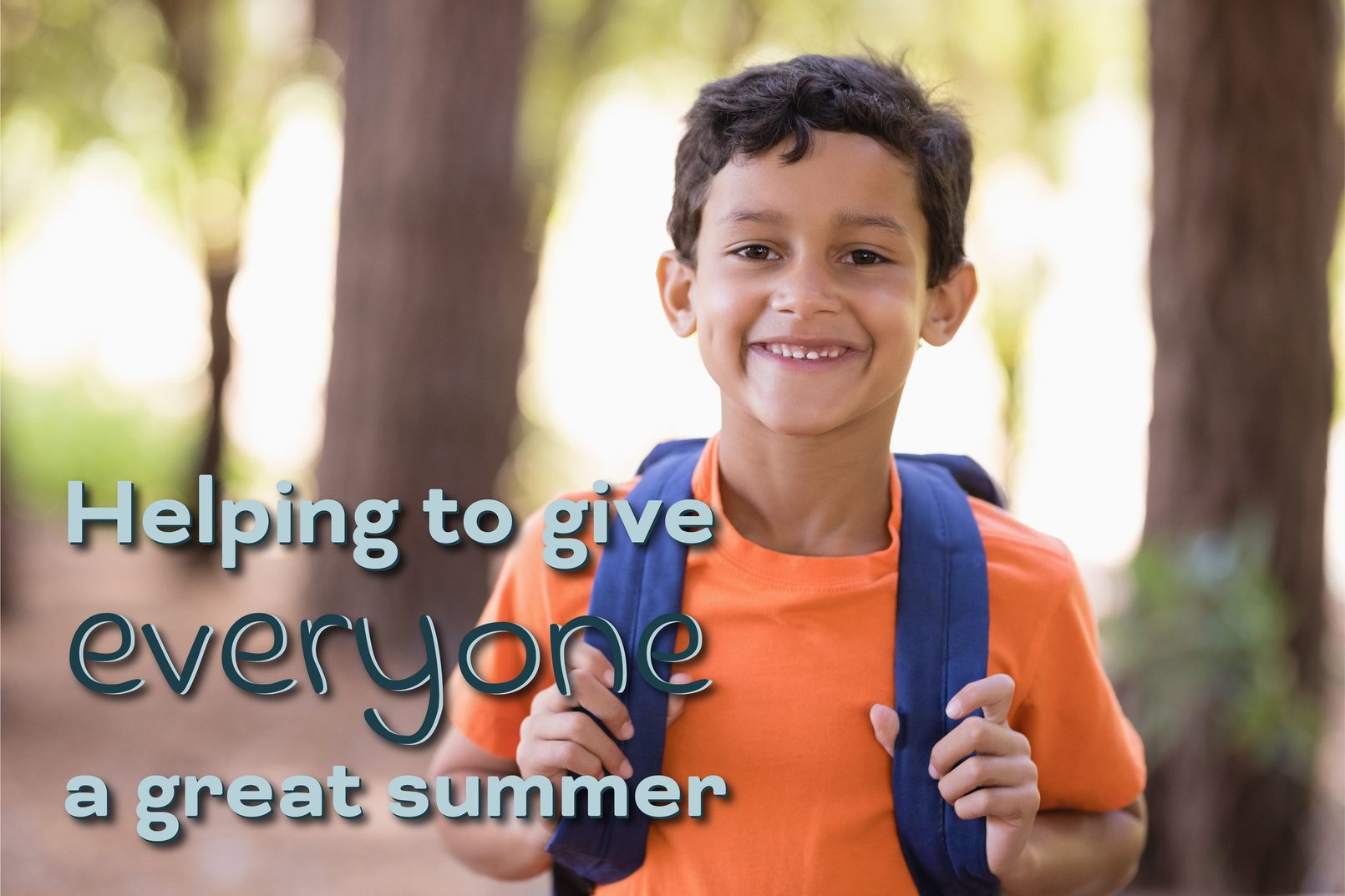 A smiling boy with a backpack outdoors. Helping to give everyone a great summer.